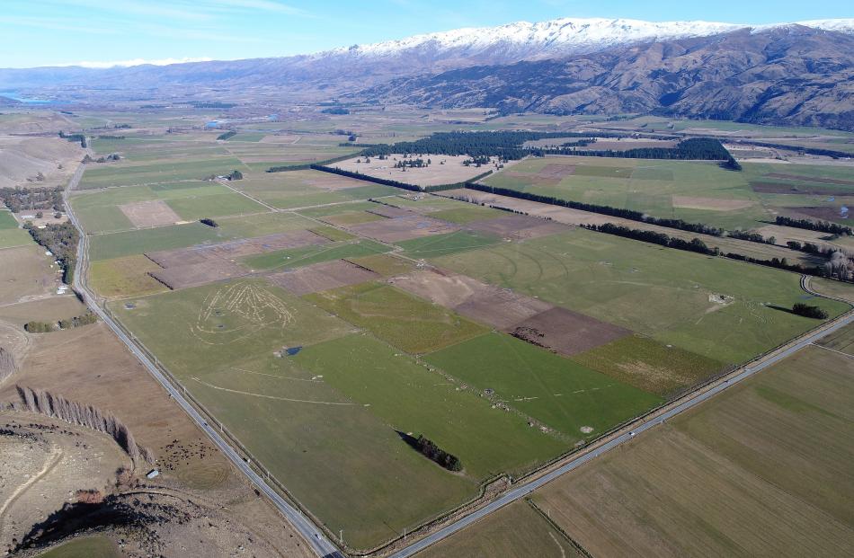 The site of the proposed Tarras airport looking towards Lake Dunstan bounded by State Highway 8 ...