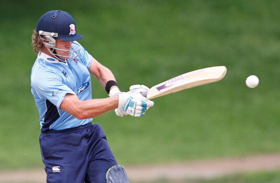 Lou Vincent hits a boundary for the Auckland Aces in the 2011 one day semi-final match. Photo:...