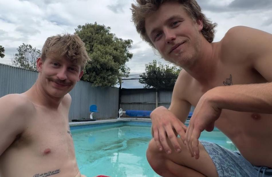 Matthew Simpson (left) and Jack Newsome started swimming laps every day in February to raise...