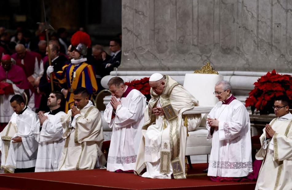 Pope Francis celebrates Christmas Eve Mass in St Peter's Basilica at the Vatican. Photo: Reuters ...