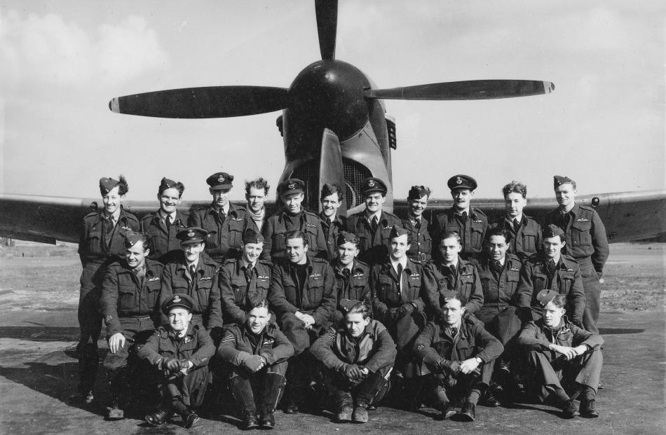 Owen Hunter, second from the left in the front row, with No. 485 (NZ) Squadron. Photo: Supplied
