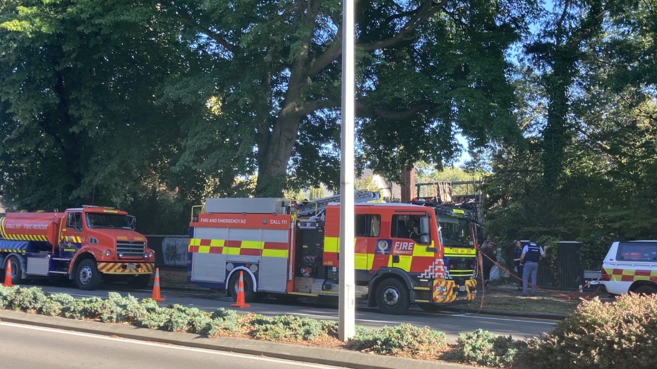 Firefighters at the Fendalton house this morning. Photo: Geoff Sloan