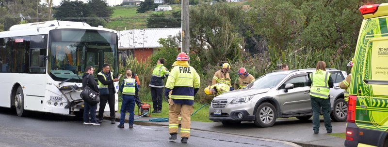 Emergency services at the scene of an accident involving a bus and a station wagon in Tomahawk Rd...