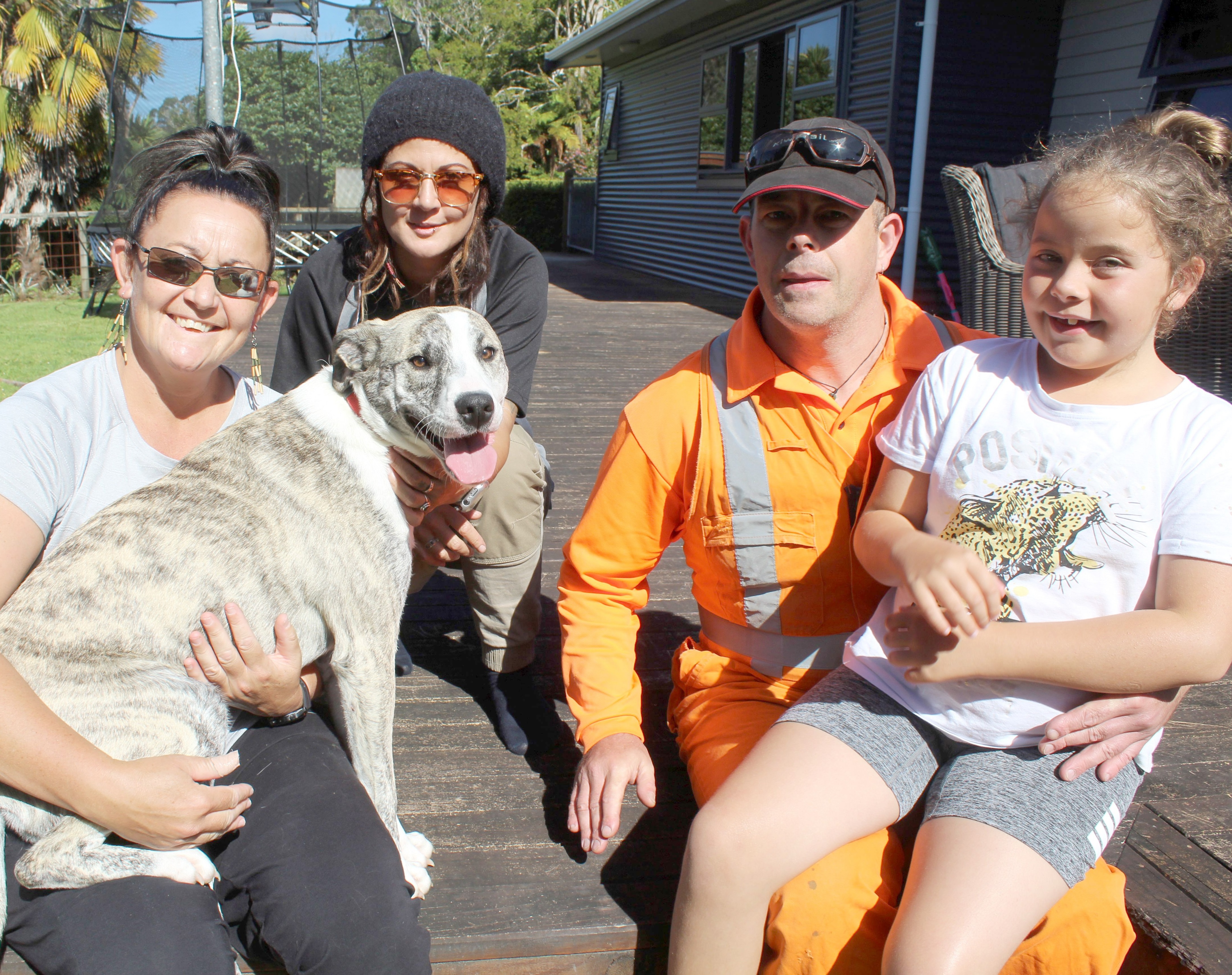 Dixie, at home in Rutherglen with adopted family (from left) Lisa Brewer, trainee locomotive...