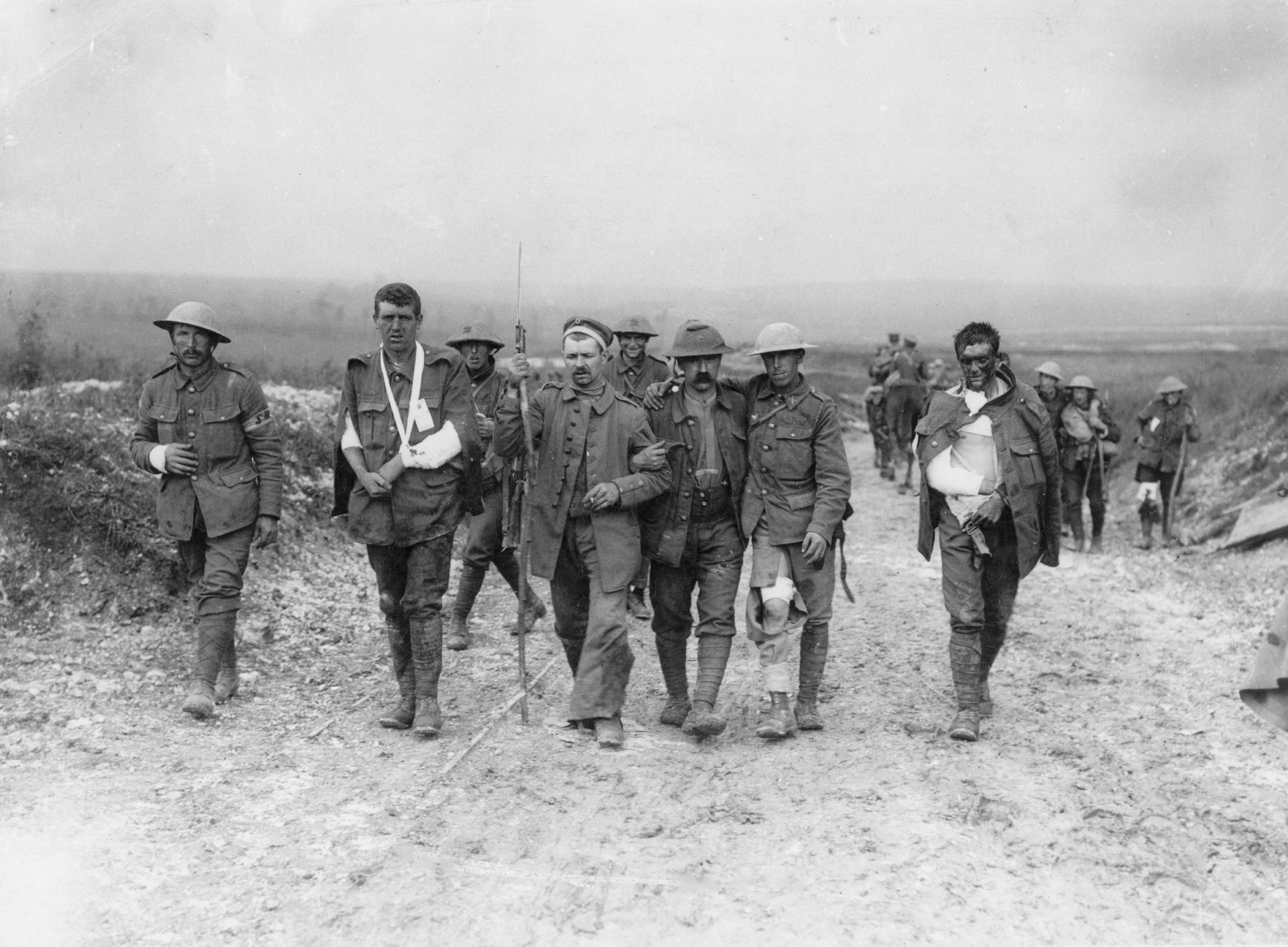 Wounded British prisoners of war shepherded by a German soldier. PHOTOS: SUPPLIED.



