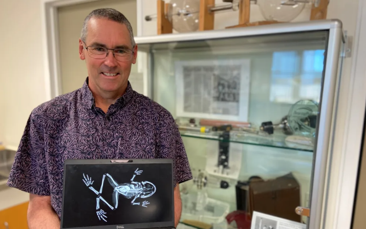 Christchurch Hospital medical physicist Steven Muir with a recent x-ray of the 142-year-old frog....
