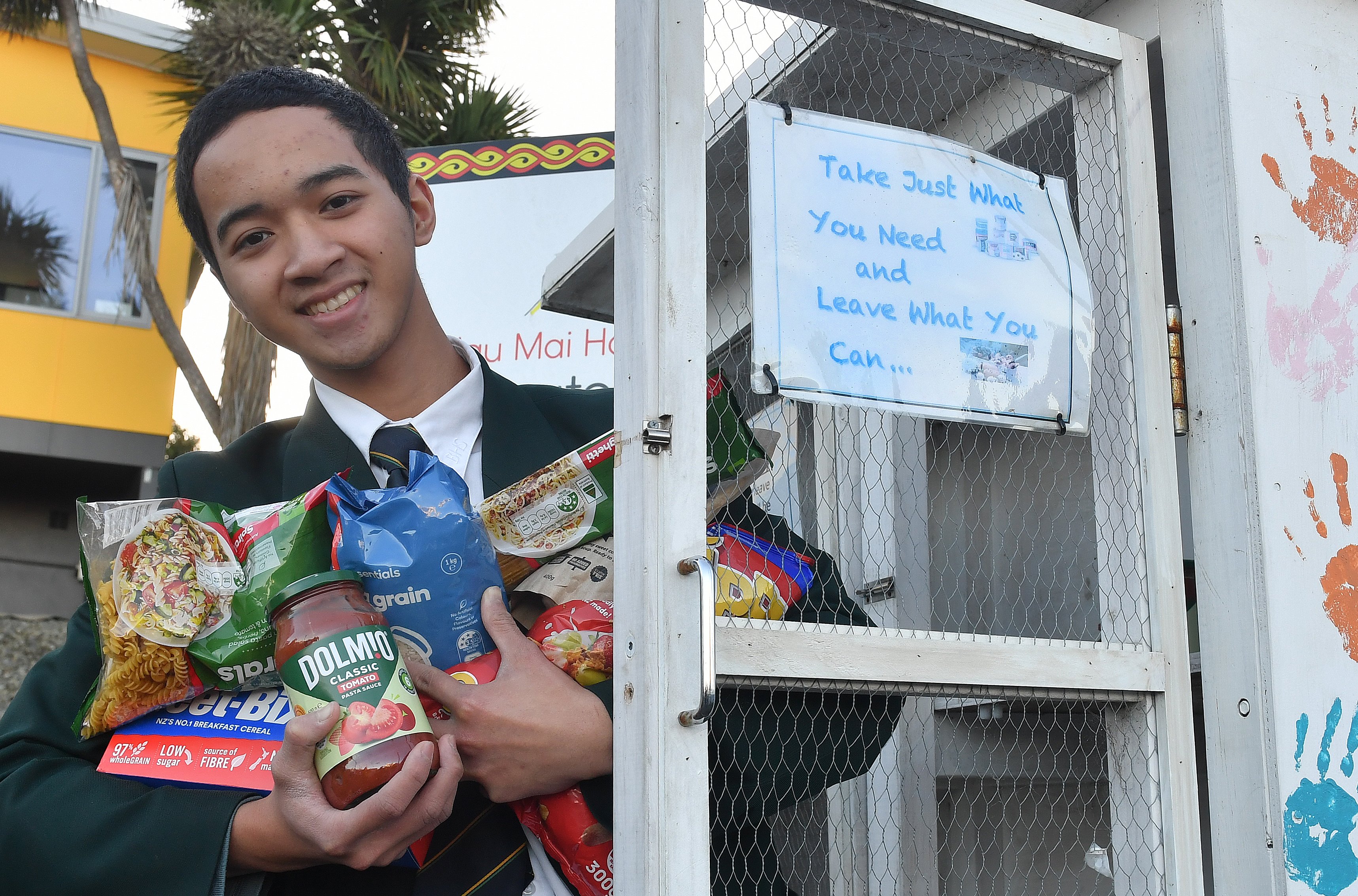Bayfield High School year 13 student Yuta Wibowo outside the Mornington School food pantry he has...