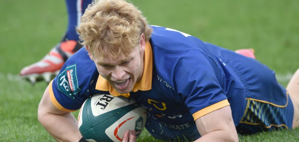 Otago fullback Finn Hurley celebrates his try during an NPC game at Forsyth Barr Stadium this...