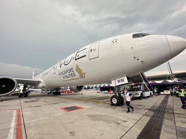 A Singapore Airlines aircraft is seen on tarmac after requesting an emergency landing at Bangkok...
