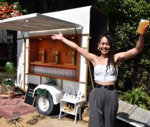 Shaquille Spooner-Nixon has converted a small horse float into a mobile self-pouring bar. Photo:...